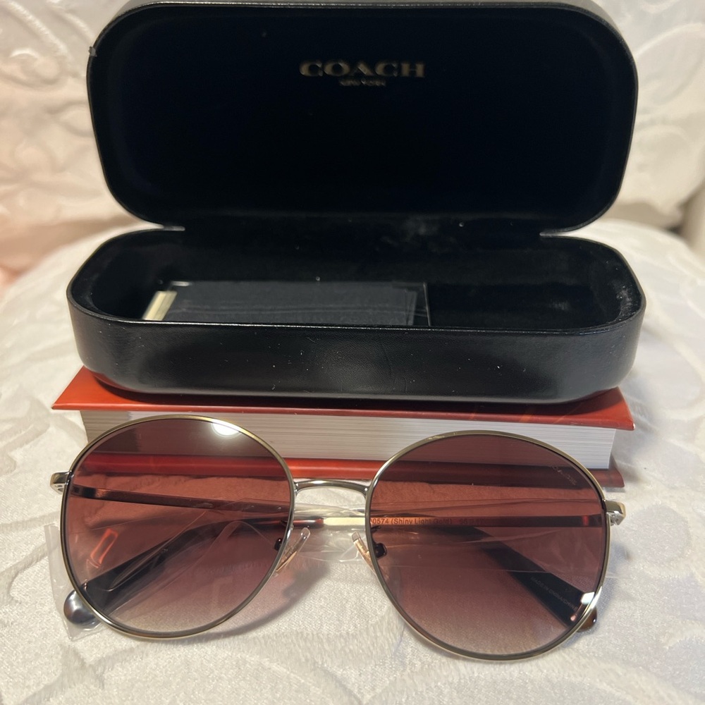 Lia Round Sunglasses from coach where fashion meets function US$193